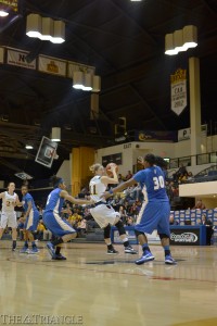 Senior guard Hollie Mershon splits the Hofstra University defense in Drexel’s 59-53 win Jan. 17 at the DAC. Although Mershon scored only nine points in the game, she still leads the Colonial Athletic Association in scoring, averaging 17.7 points per game.