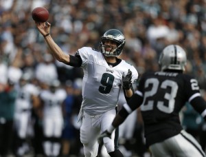 Philadelphia Eagles starting quarterback Nick Foles throws a touchdown pass against the Oakland Raiders in the first quarter at O.co Coliseum in Oakland, Calif., Nov. 3.