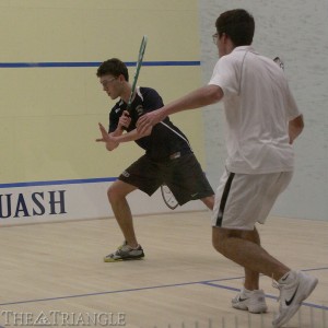 Sophomore Joey Gingold goes for the ball during a squash match against Colgate University Feb. 8. The Dragons triumphed over the Raiders 9-0 at the Kline and Specter Squash Center in their matchup last season.