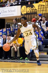 Freshman Rodney Williams drives during Drexel’s 90-77 loss to the University of Delaware Jan. 20. Williams had his first career double-double in the Dragons’ 78-60 win over James Madison University Feb. 8.