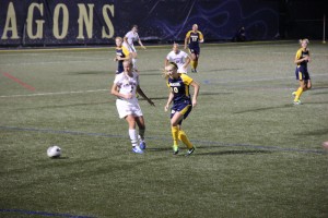 Then-junior Megan Hammaker dribbles past a defender September 9, 2013, in a home game against Longwood University. Hammaker is one of the few returning upperclassmen on the women’s soccer team this season, a team replete with young talent after bringing in eight freshmen. (Ajon Brodie - The Triangle)