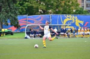 Sophomore defender Abbey Romano boots a ball out of the zone during the first half of the draw against UD. (Ken Chaney - The Triangle)