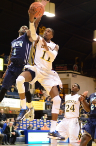 Junior Guard Tavon Allen attempts a shot during a home game last season. Allen and the Drexel men's basketball team fell to the University of Colorado Friday night. (Ken Chaney - The Triangle)