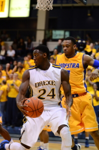 Forward Rodney Williams makes a move in the paint during a game at the Daskalakis Athletic Center against Hofstra University. (Ken Cheney - The Triangle)