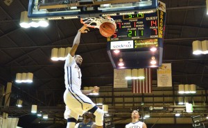 Junior guard Tavon Allen throws down a dunk in the first half Nov. 30 against Southern Mississippi. (Ken Chaney - The Triangle)