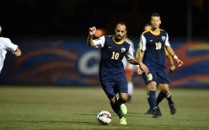Michele Pataia dribbles up field during the Dragons’ matchup with the University of Delaware Oct. 29. The Dragons lost 4-0 in the game and then ended their season 3 days later against the University of North Carolina at Wilmington at home, where they lost 3-0. The team ended its disappointing season with a 5-10-3 record. (Photo Courtesy - DrexelDragons.com)