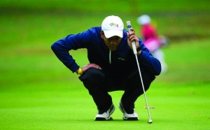 Sophomore golfer Yoseph Dance sizes up a putt. The Drexel University golf team will compete in the Colonial Athletic Association tournament April 24 through April 26. (Photo Courtesy - Drexel Dragons)