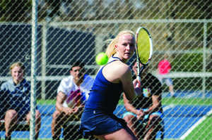 Sophomore Lea Winkler sizes up an incoming ball. Winkler and the women’s tennis team won a program-record 15 matches this season. (Ajon Brodie - The Triangle)