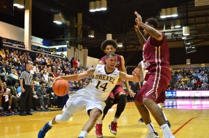 Former Drexel guard Damion Lee drives on St. Joe's in November 2014. (Ken Chaney - The Triangle)