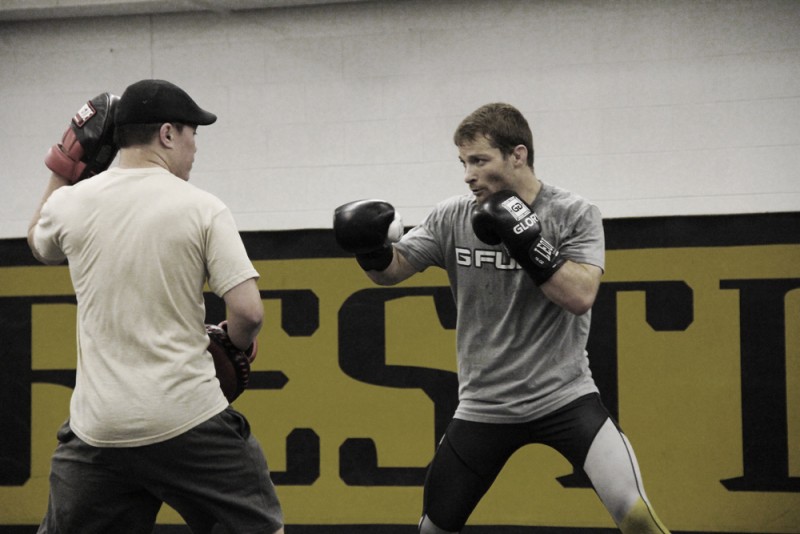 Makovsky spars with friend and trainer Ricky Lee in his first session May 14. (Ajon Brodie - The Triangle)