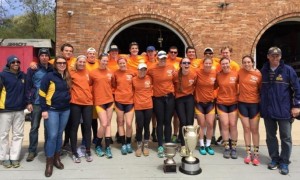 The women’s and men’s crew members celebrate with their Bergen and Kelly Cups after sweeping the Bergen Cup Regatta on the Schuylkill River April 25. (Photo Credit - Drexel Dragons)