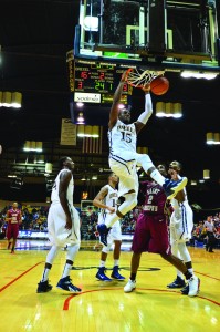 Drexel forward Mohamed Bah, pictured dunking here, will play for the Malian  national team this August in AfroBasket 2015 for a spot in the 2016 Olympics. (Ken Chaney - The Triangle)