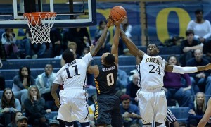 Guard Tavon Allen and Forward Rodney Williams combine for a block during the 2014-2015 season. With a team that is finally healthy, the Dragons will look to improve upon the disappointing 2014 campaign. (Photo courtesy Drexeldragons.com)
