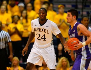 Senior Rodney Williams plays defense against High Point early in the season. Williams has been a big contributor for the Dragons this season, averaging 9.5 points per game. Photo courtesy Drexeldragons.com