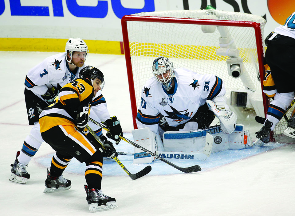 The San Jose Sharks&apos; Paul Martin (7) helps goaltender Martin Jones (31) make a save against the Pittsburgh Penguins&apos; Conor Sheary (43) in the third period of Game 5 of the Stanley Cup Final at Consol Energy Center in Pittsburgh, Pa., on Thursday, June 9, 2016. The Sharks won, 4-2, to cut the Pens&apos; series lead to 3-2. (Josie Lepe/Bay Area News Group/TNS)